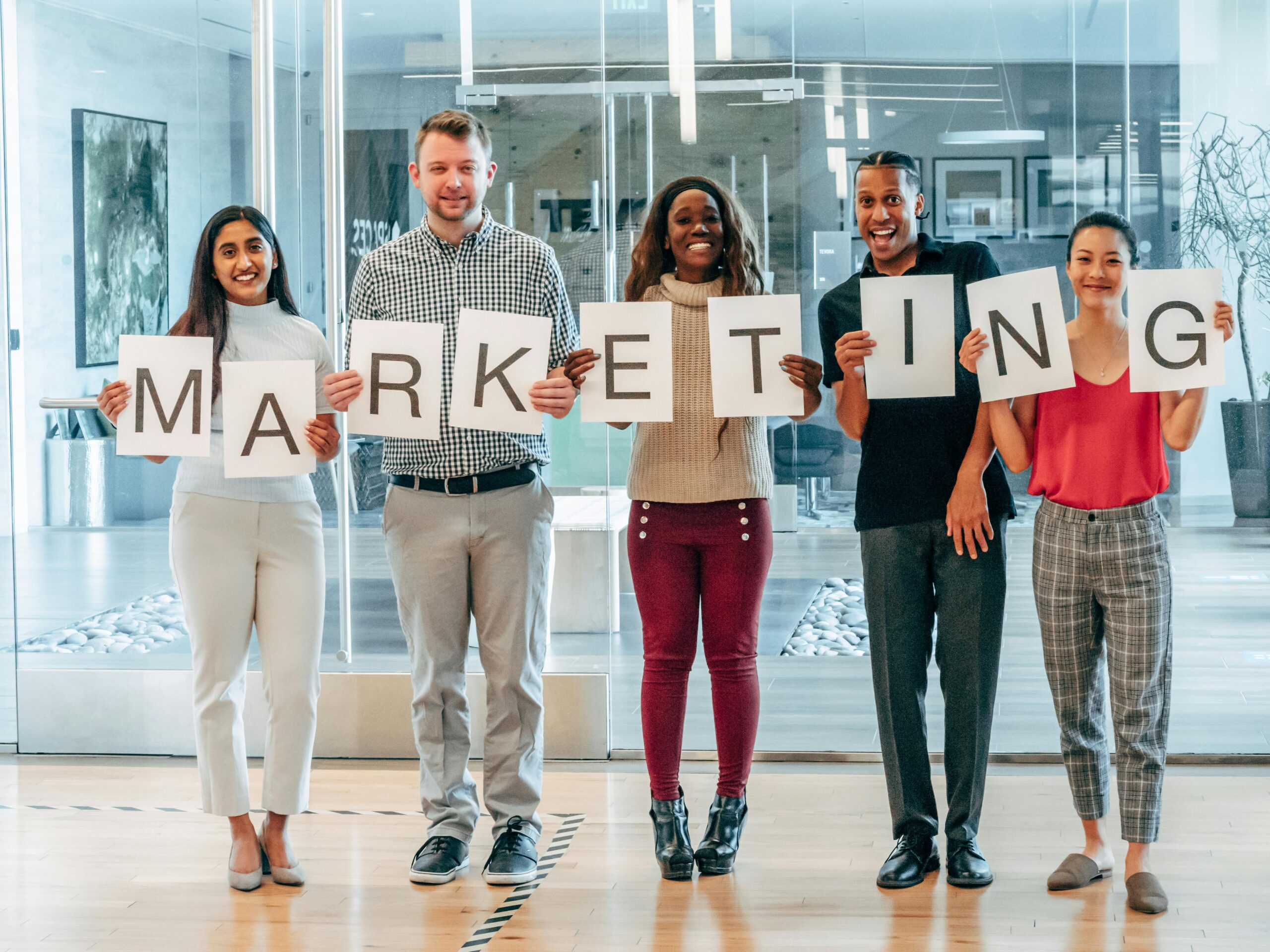 A team encouraging people to start a career in marketing